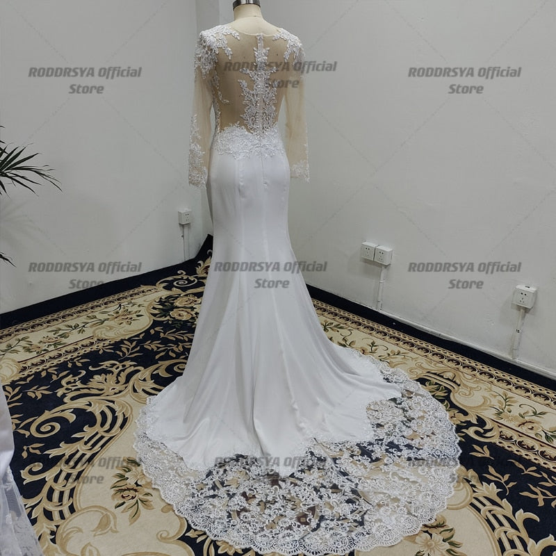 Floniel  Designer Long Sleeves Sheer Illusion Lace Appliques Mermaid Wedding Dresses Bridal Gowns See Through Back