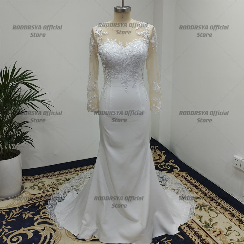 Floniel  Designer Long Sleeves Sheer Illusion Lace Appliques Mermaid Wedding Dresses Bridal Gowns See Through Back