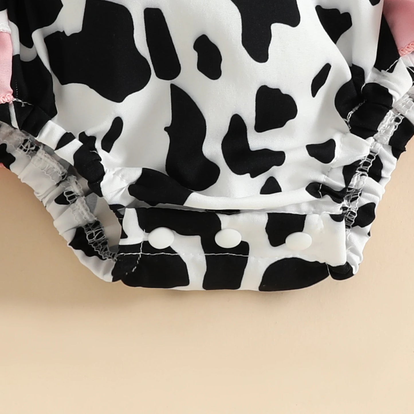 Girls Cow Print Bowknot Sleeveless Onesie